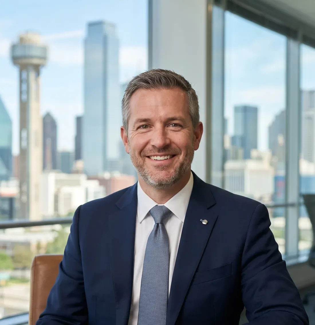 Michael R. Cowell, CPA and founder of Cowell & Co., seated in a downtown office with the Dallas skyline behind him.